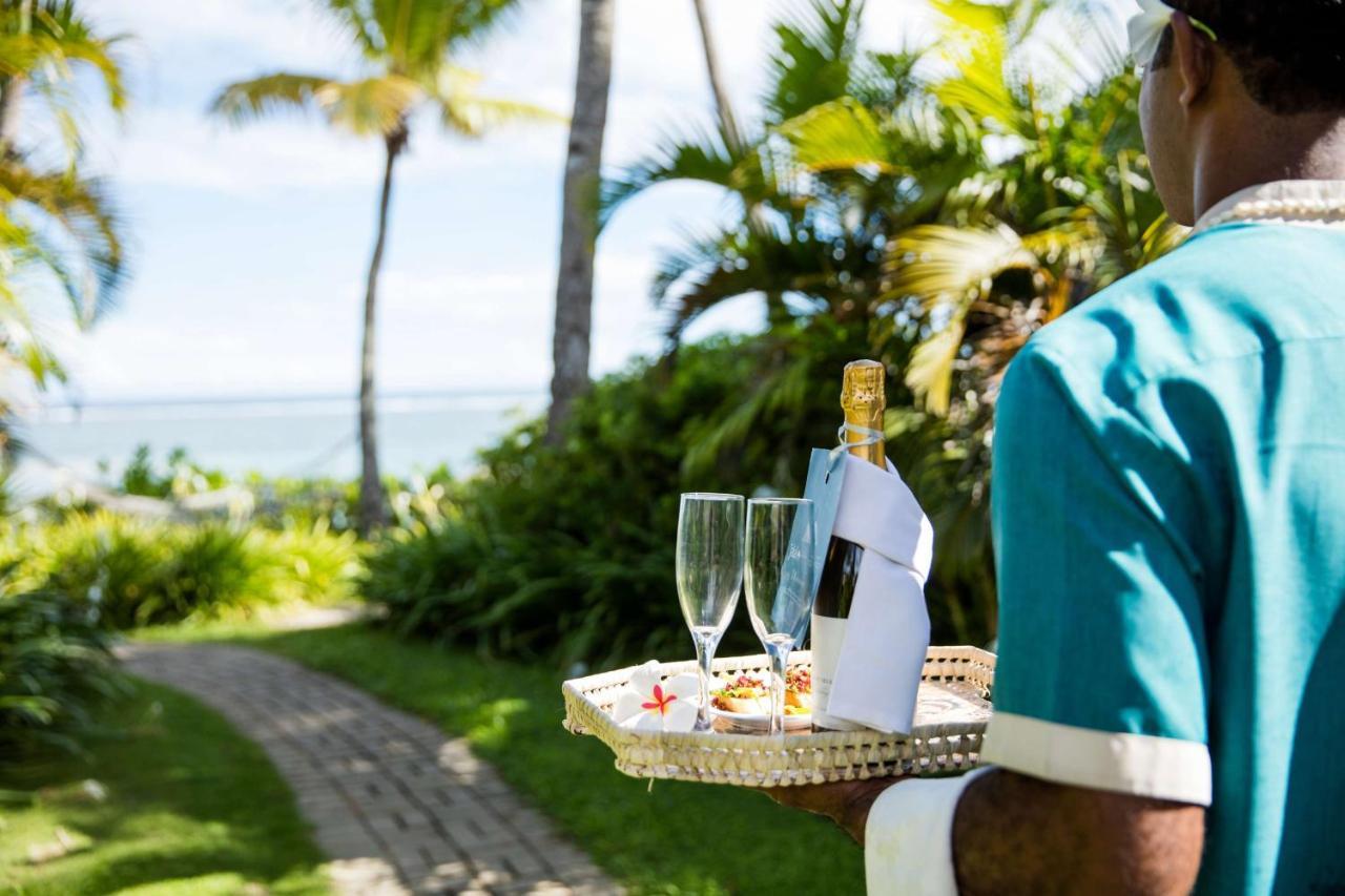 Outrigger Fiji Beach Resort Korotogo Ngoại thất bức ảnh A butler at the Four Seasons Resort Maldives at Landaa Giraavili