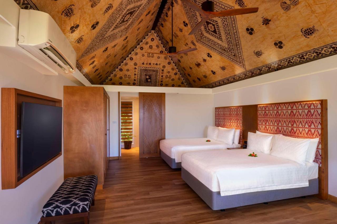 Outrigger Fiji Beach Resort Korotogo Ngoại thất bức ảnh A bedroom at the Sheraton Resort Fiji