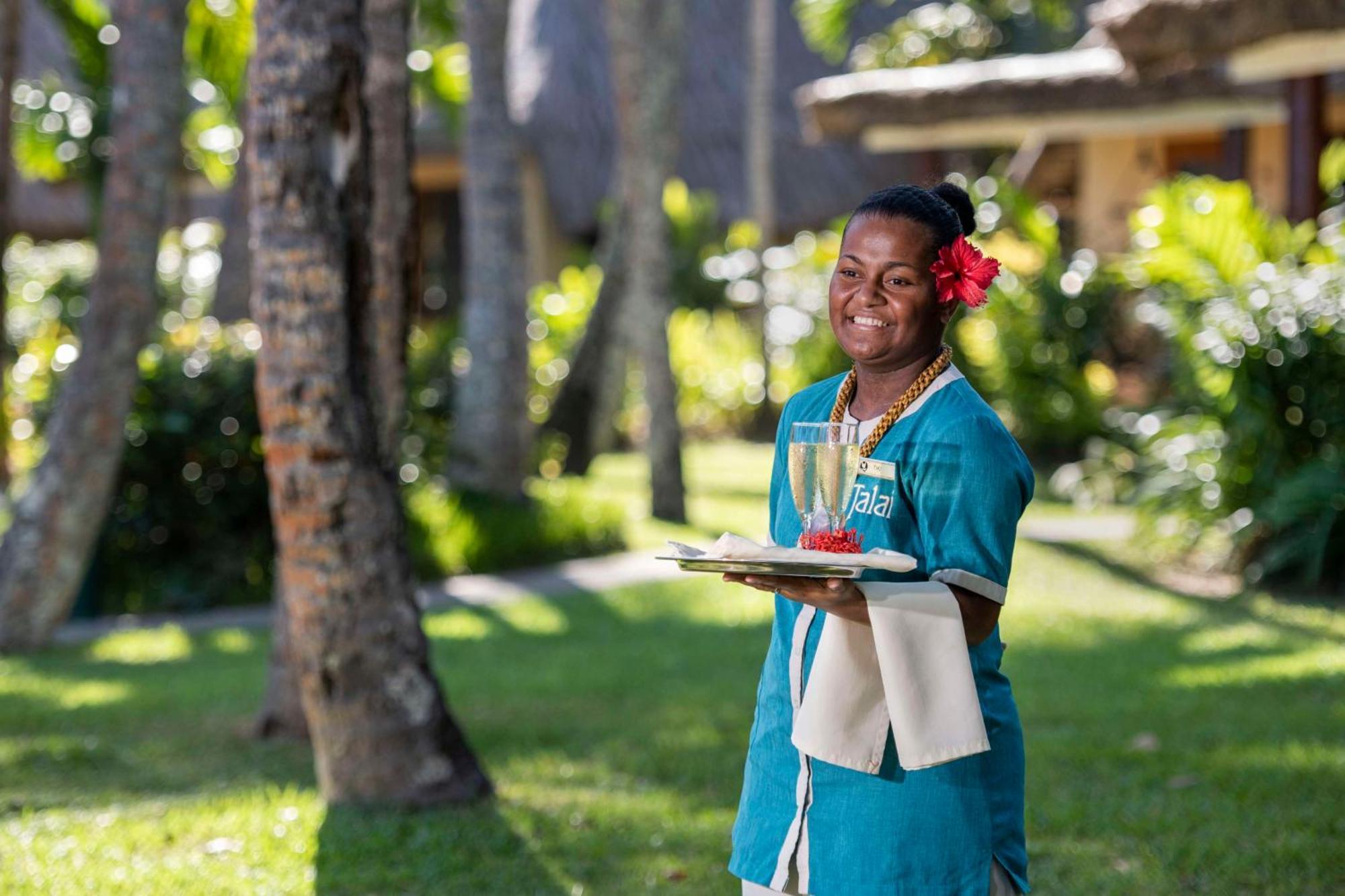 Outrigger Fiji Beach Resort Korotogo Ngoại thất bức ảnh A hotel staff in Mauritius
